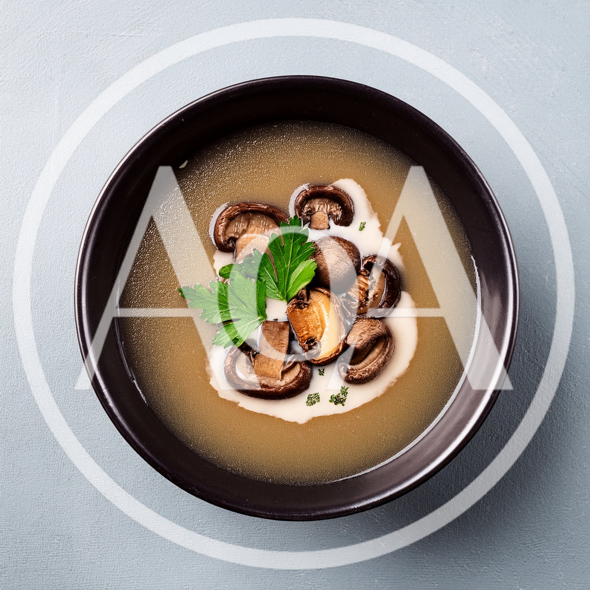 Bowl Of Creamy Mushroom Soup With Fresh Parsley