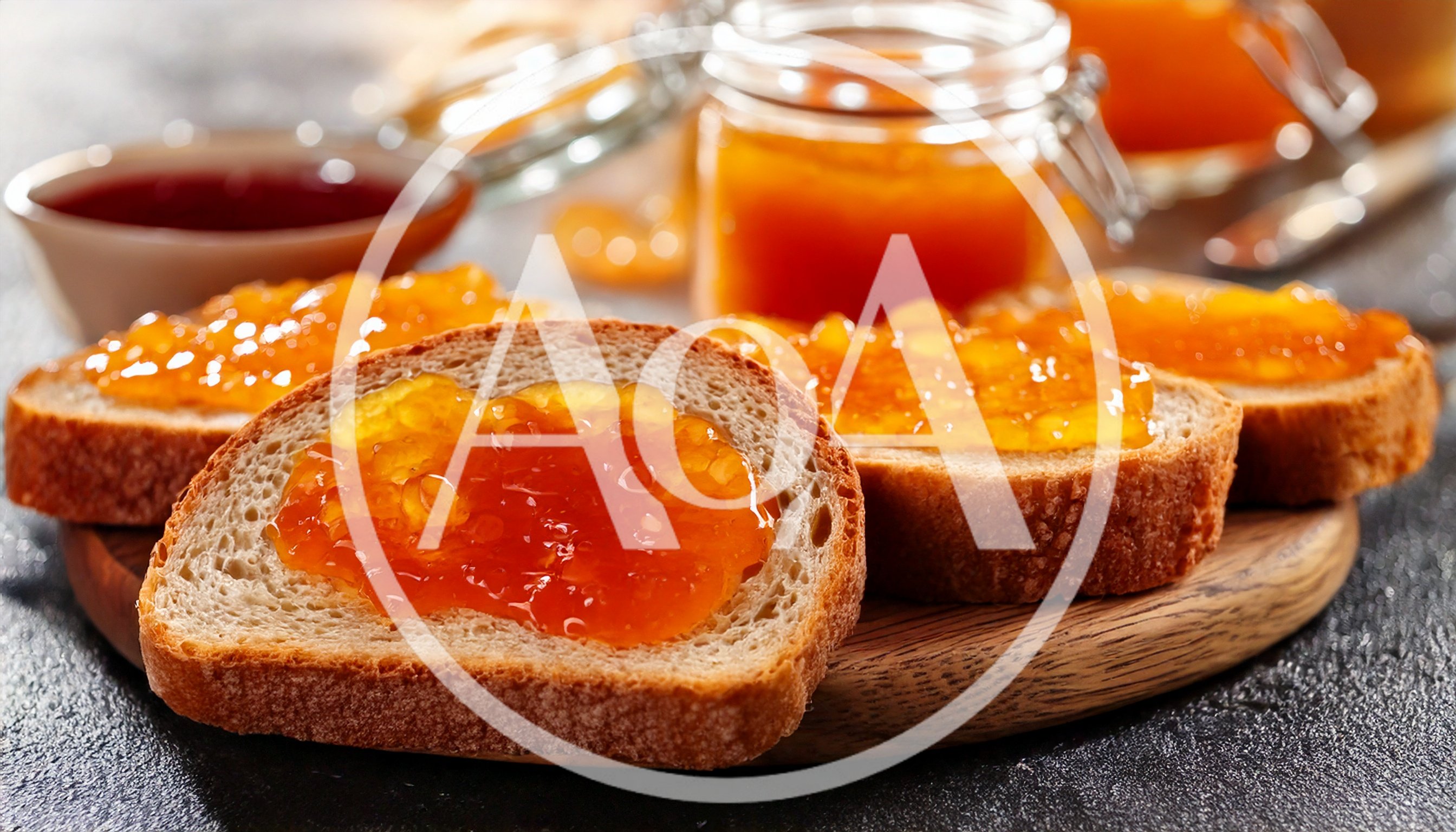 Slices of Bread Topped with Orange Marmalade Jam