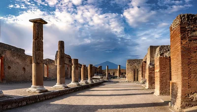Ancient Roman Ruins Of Pompeii With Mount Vesuvius