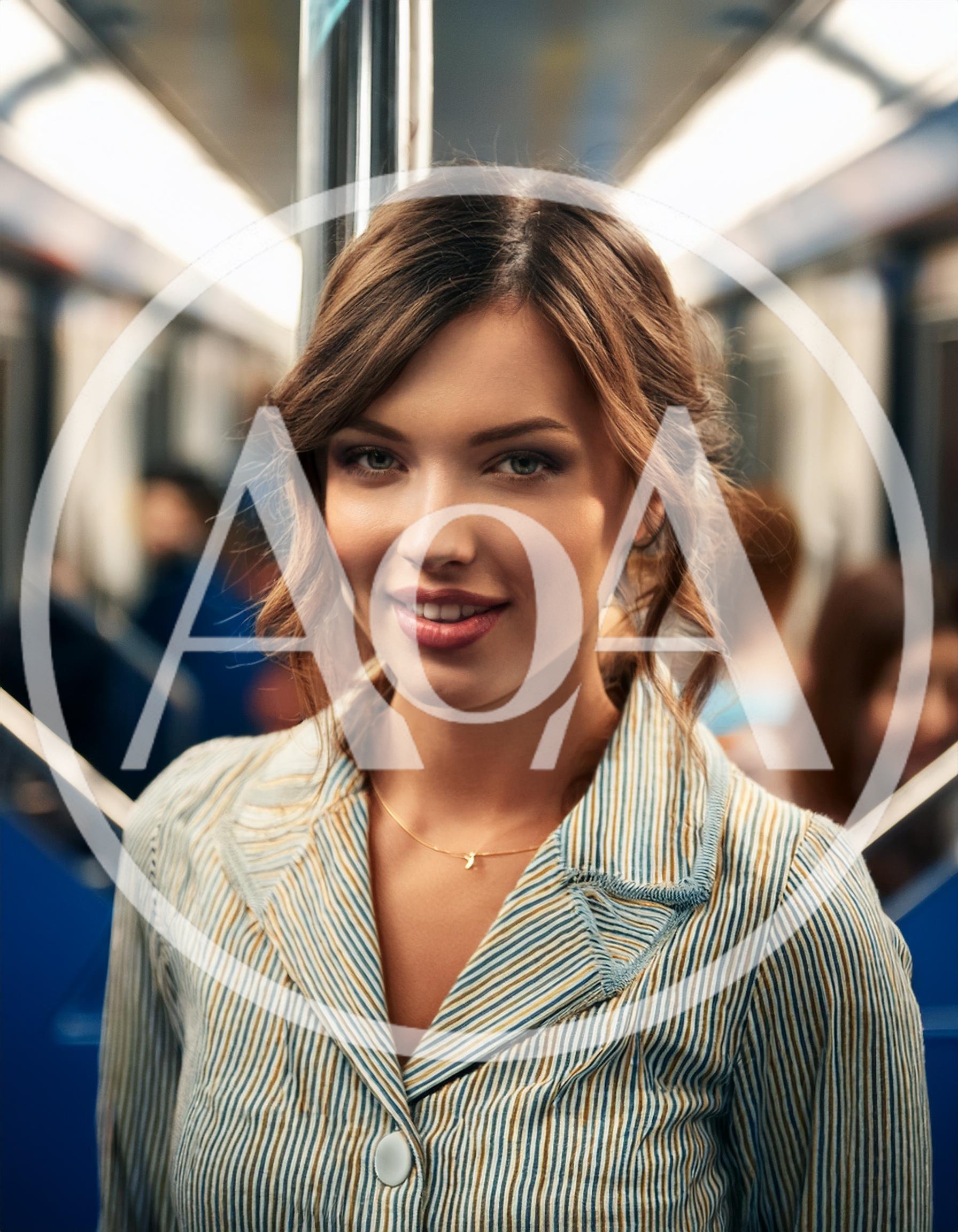 Young Woman Smiling While Riding A Subway Train