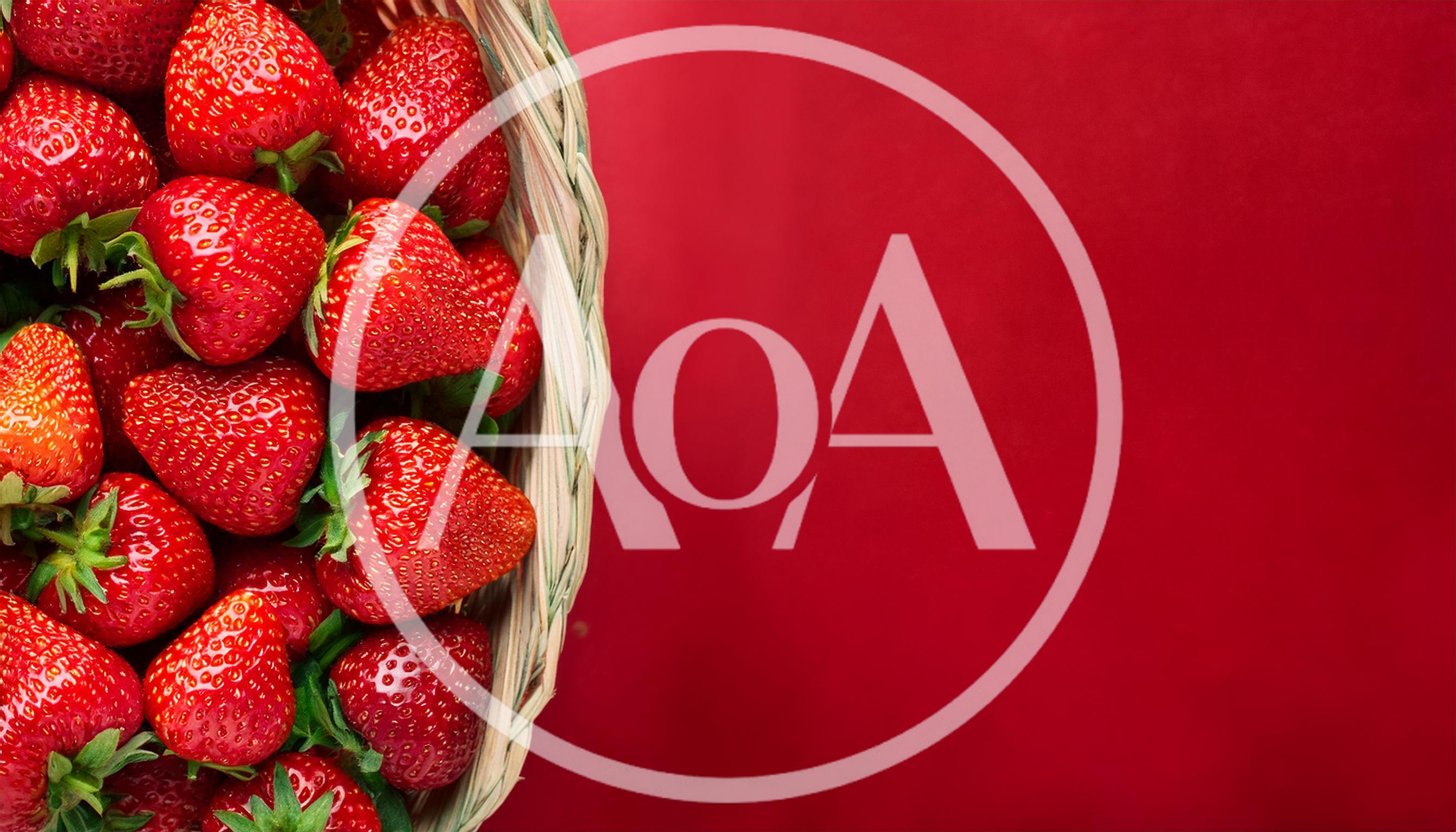 Fresh Red Strawberries In A Woven Basket