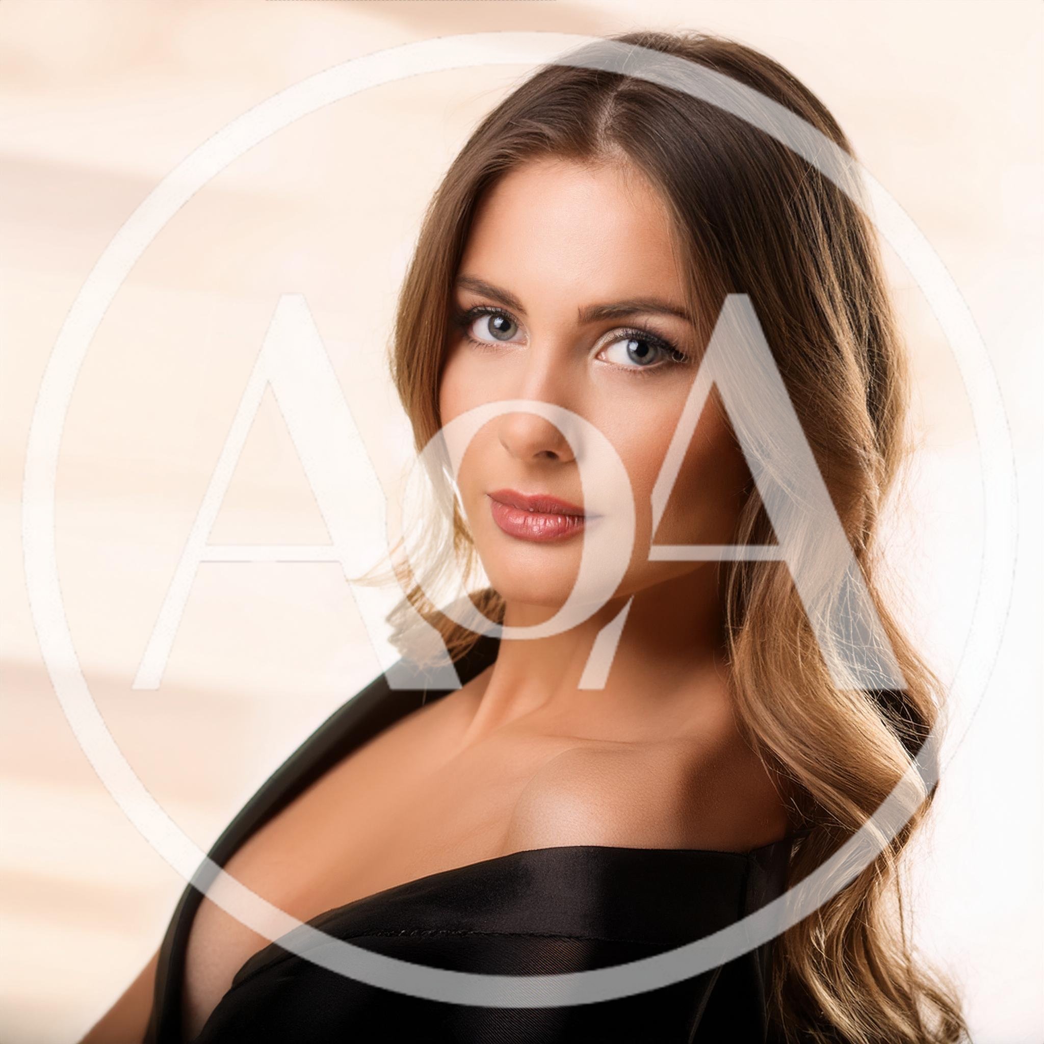 Portrait Of A Beautiful Woman In A Black Dress
