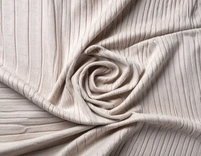 Beige Ribbed Fabric Swirl Texture