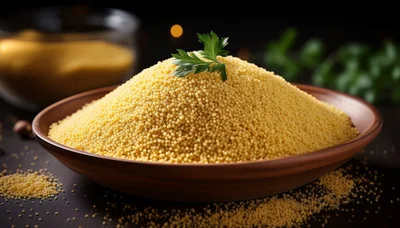 Bowl Of Cooked Couscous With Fresh Parsley Garnish
