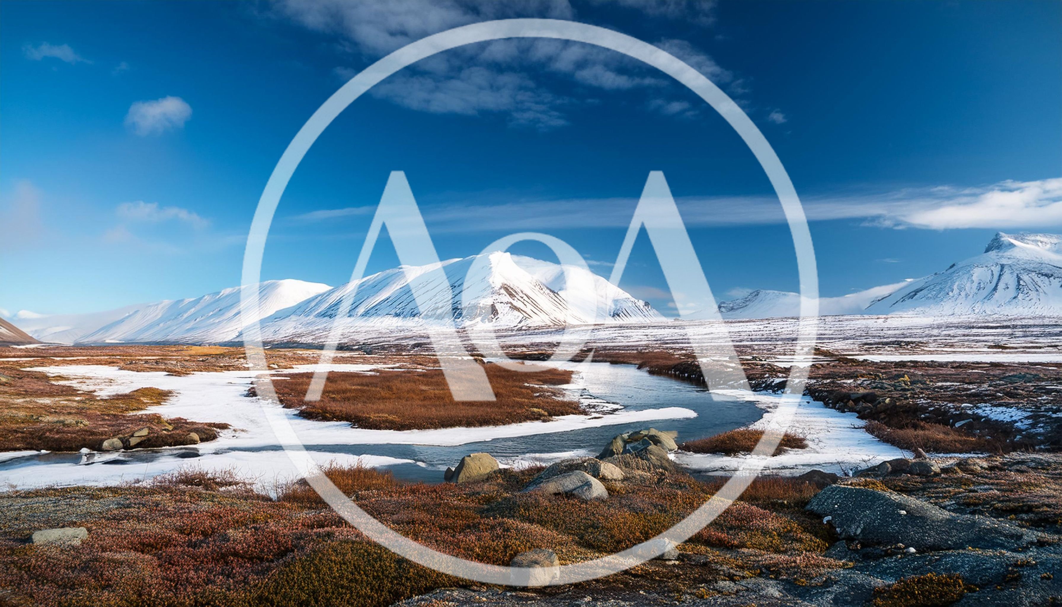 Snow Covered Mountains And Winding River In Arctic Landscape