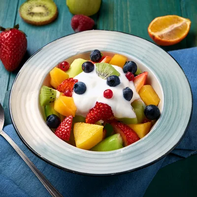 Fresh Fruit Salad Bowl With Creamy Yogurt Topping