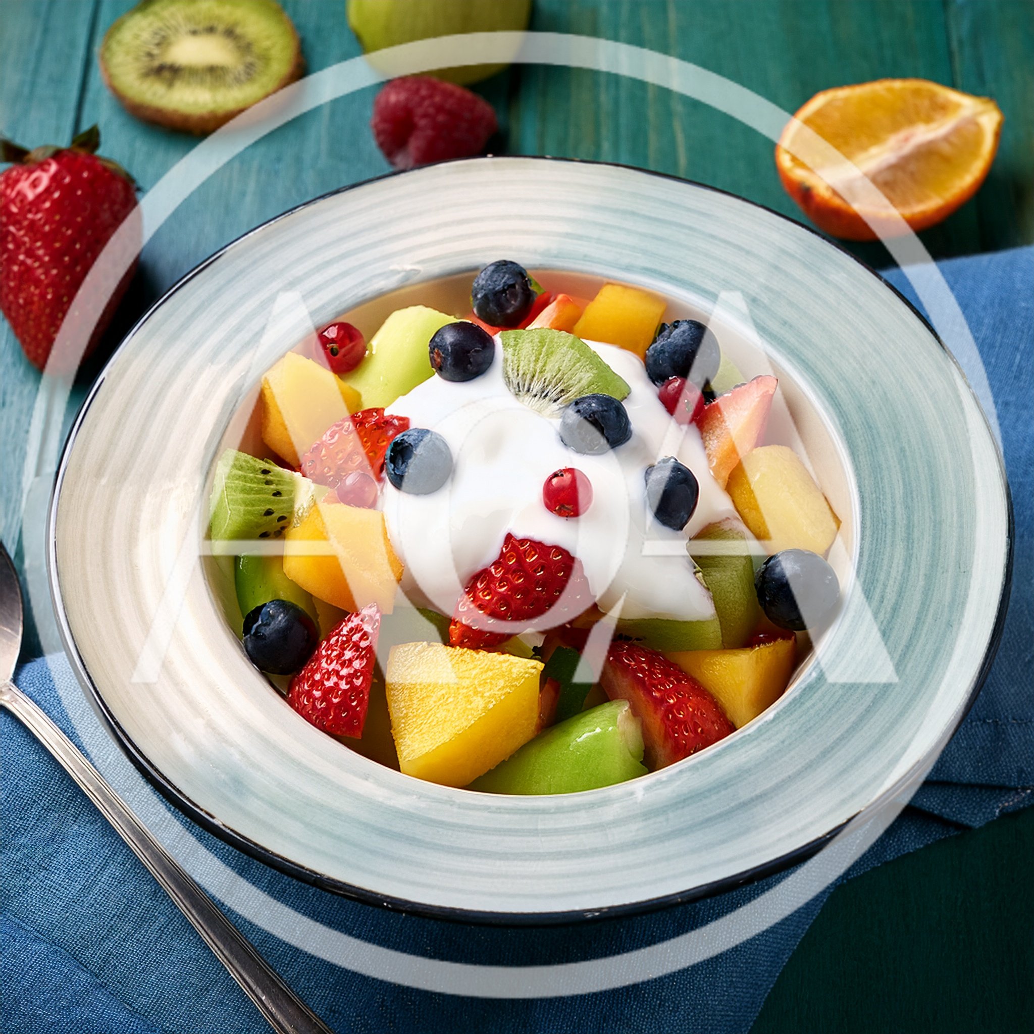 Fresh Fruit Salad Bowl With Creamy Yogurt Topping