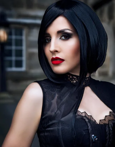 Portrait Of A Woman With A Black Bob Hairstyle