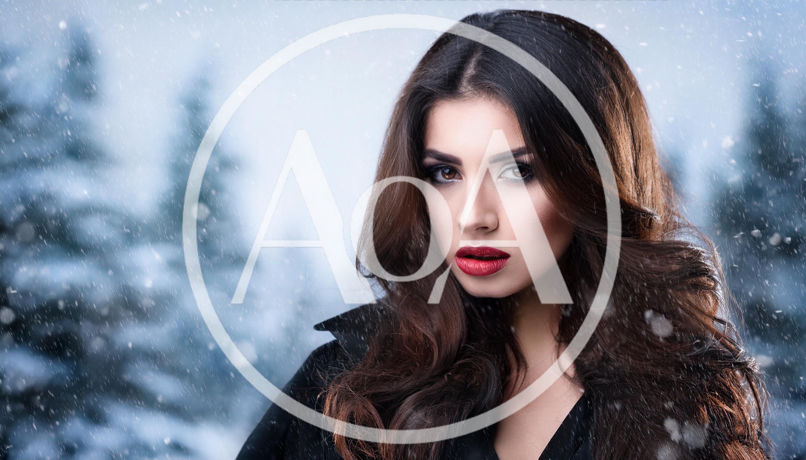 Portrait Of A Beautiful Woman In Snowy Winter Forest