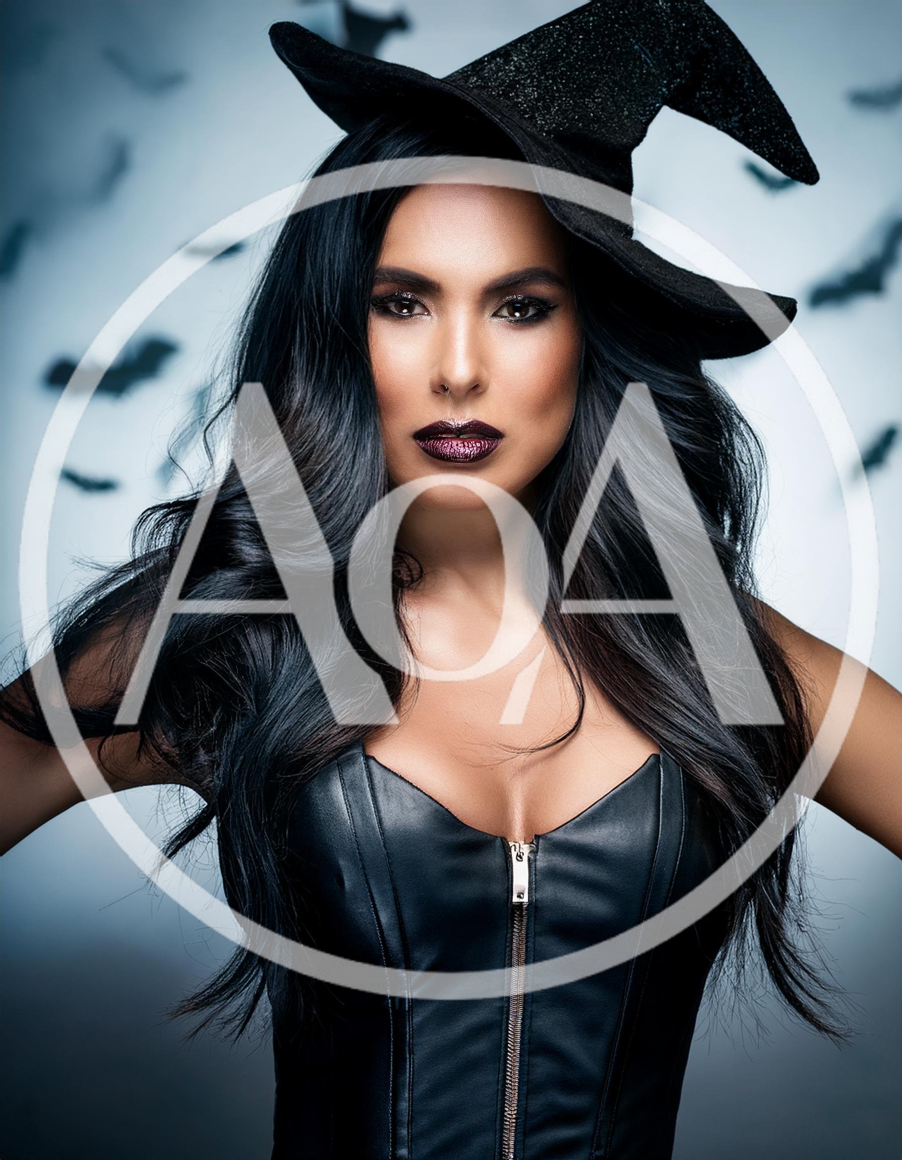 Beautiful Witch Woman In Leather Corset And Hat