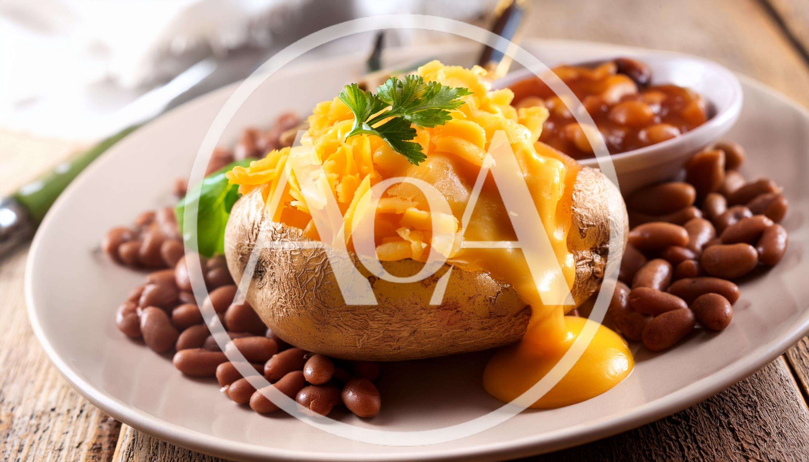 Baked Potato With Melted Cheese And Beans