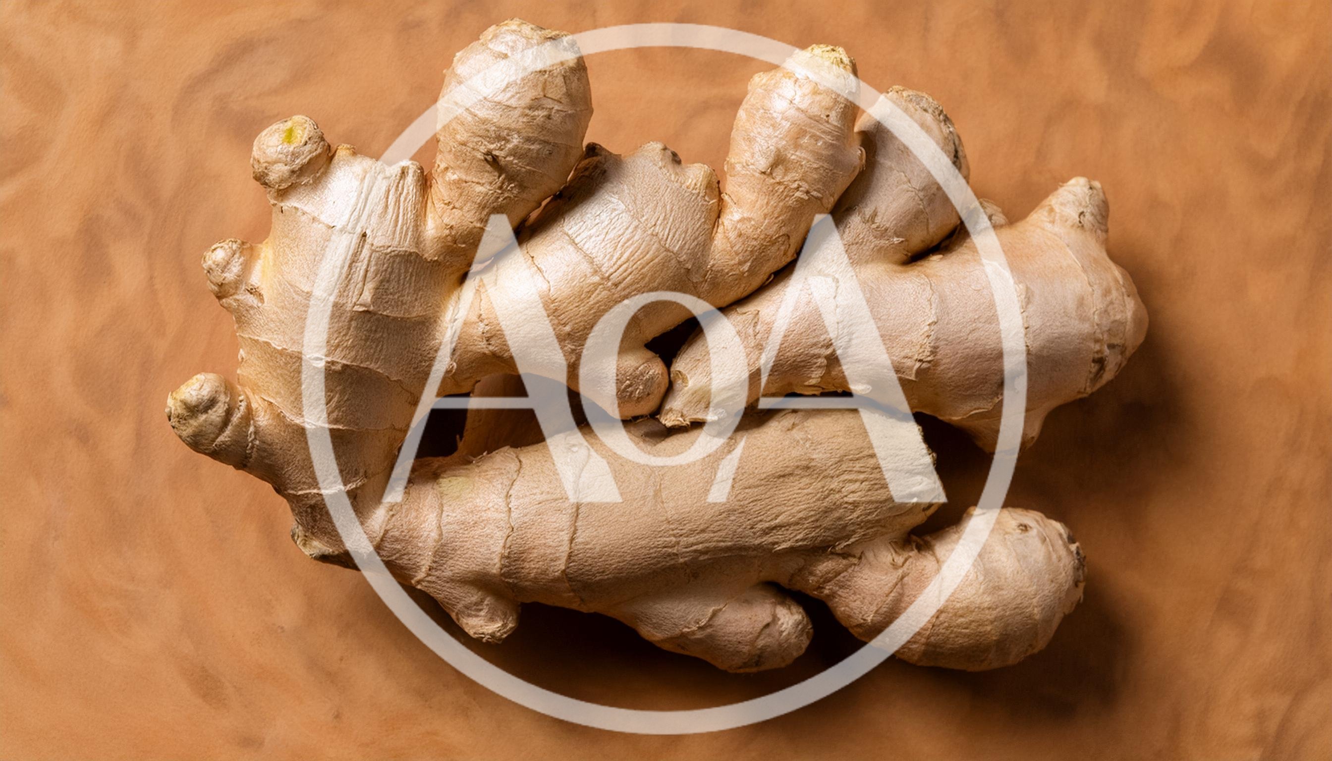 Fresh Raw Ginger Root On Textured Brown Background