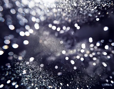 Abstract Dark Background With Shimmering Bokeh Light Effects