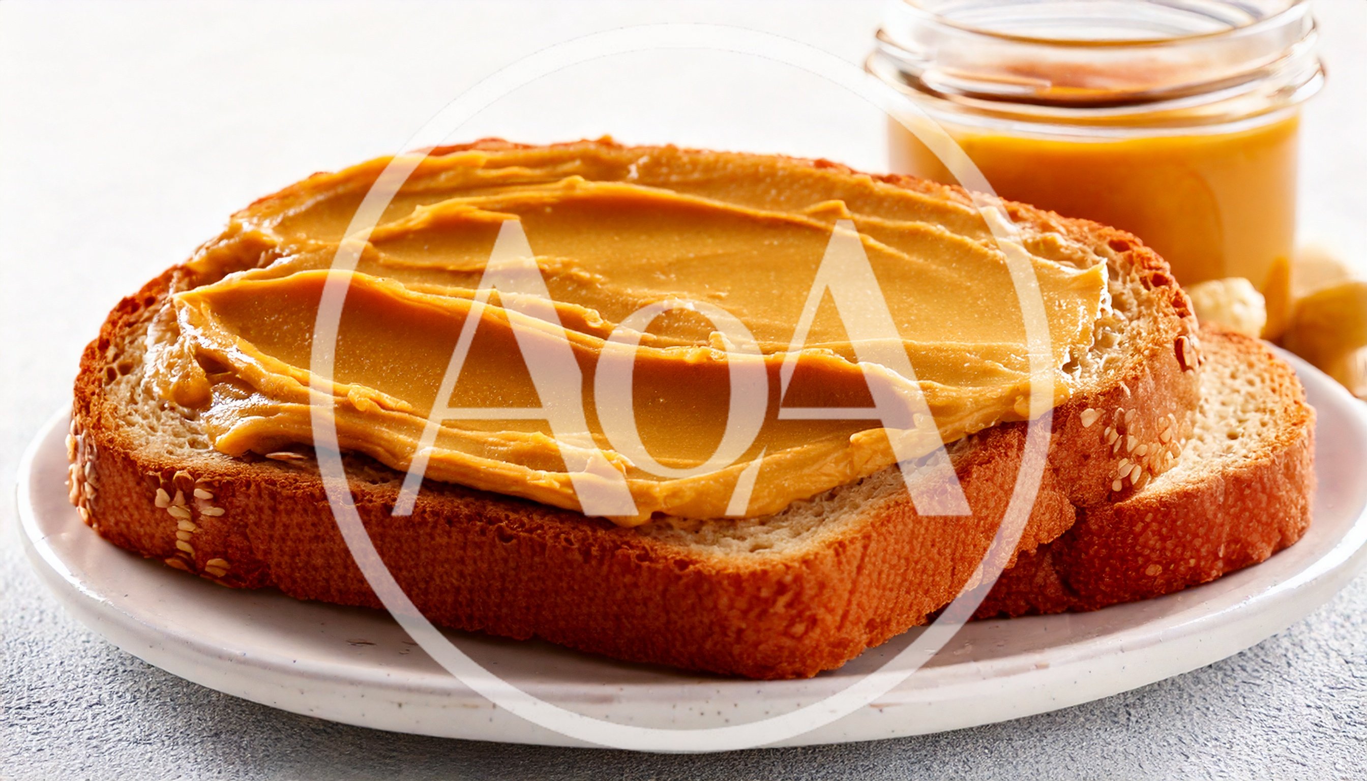 Peanut Butter Spread On Toasted Bread Slice