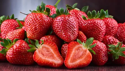 Fresh Ripe Strawberries Arranged On A Wooden Surface