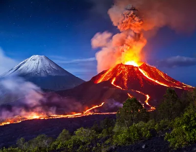 Volcanic Eruption With Lava Flows And Ash Plume