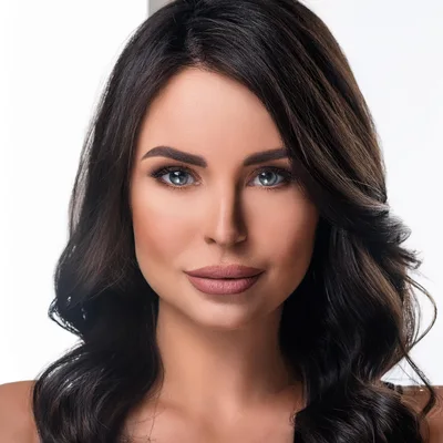 Portrait Of A Beautiful Woman With Dark Wavy Hair