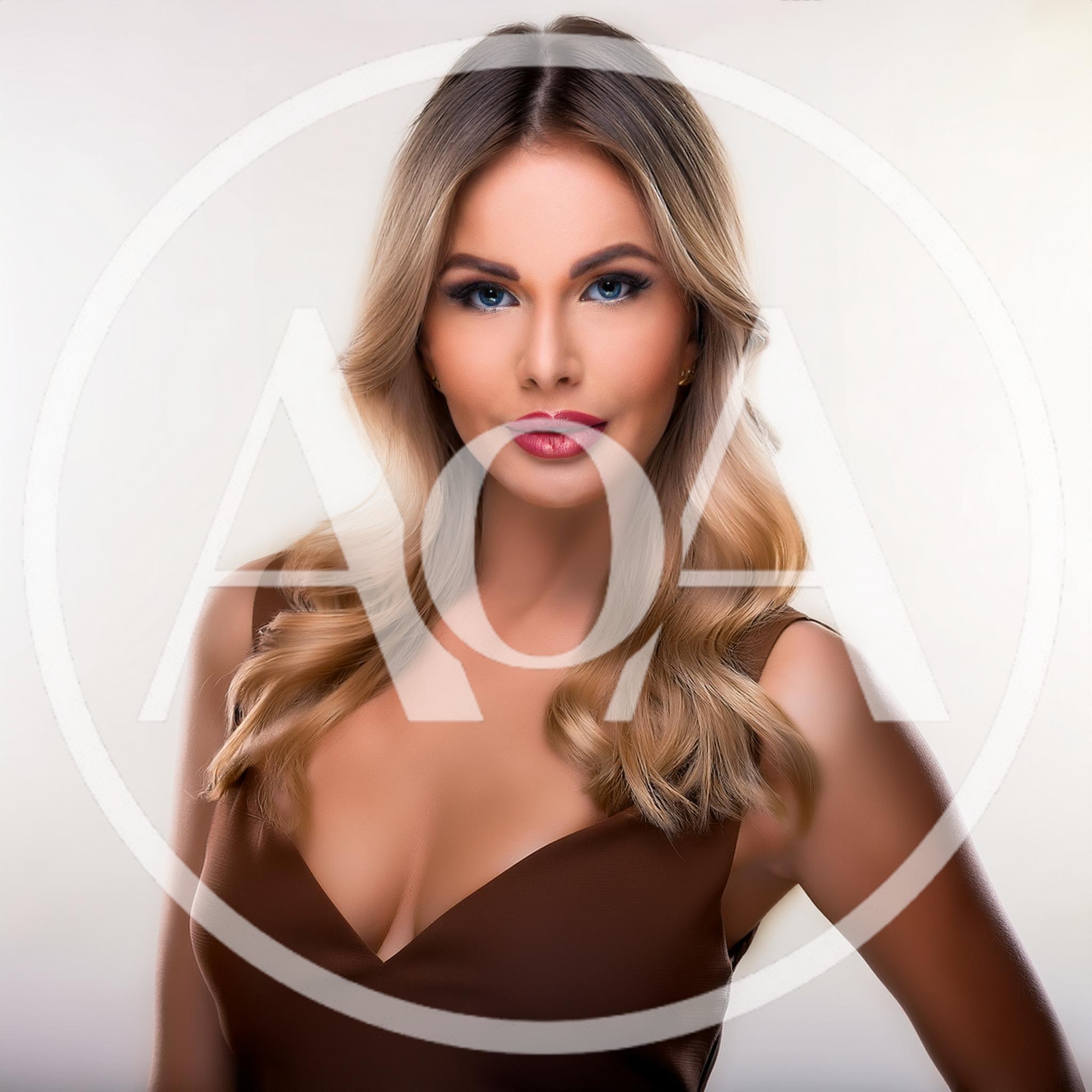 Portrait Of A Beautiful Blonde Woman In Brown Dress