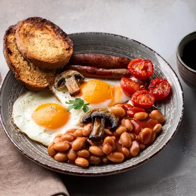 Full English Breakfast Plate With Eggs And Beans