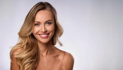 Portrait Of A Smiling Blonde Woman