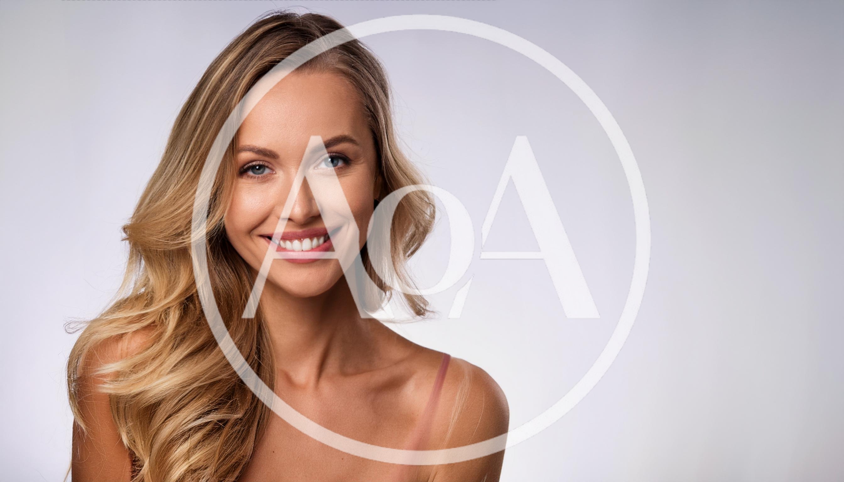 Portrait Of A Smiling Blonde Woman