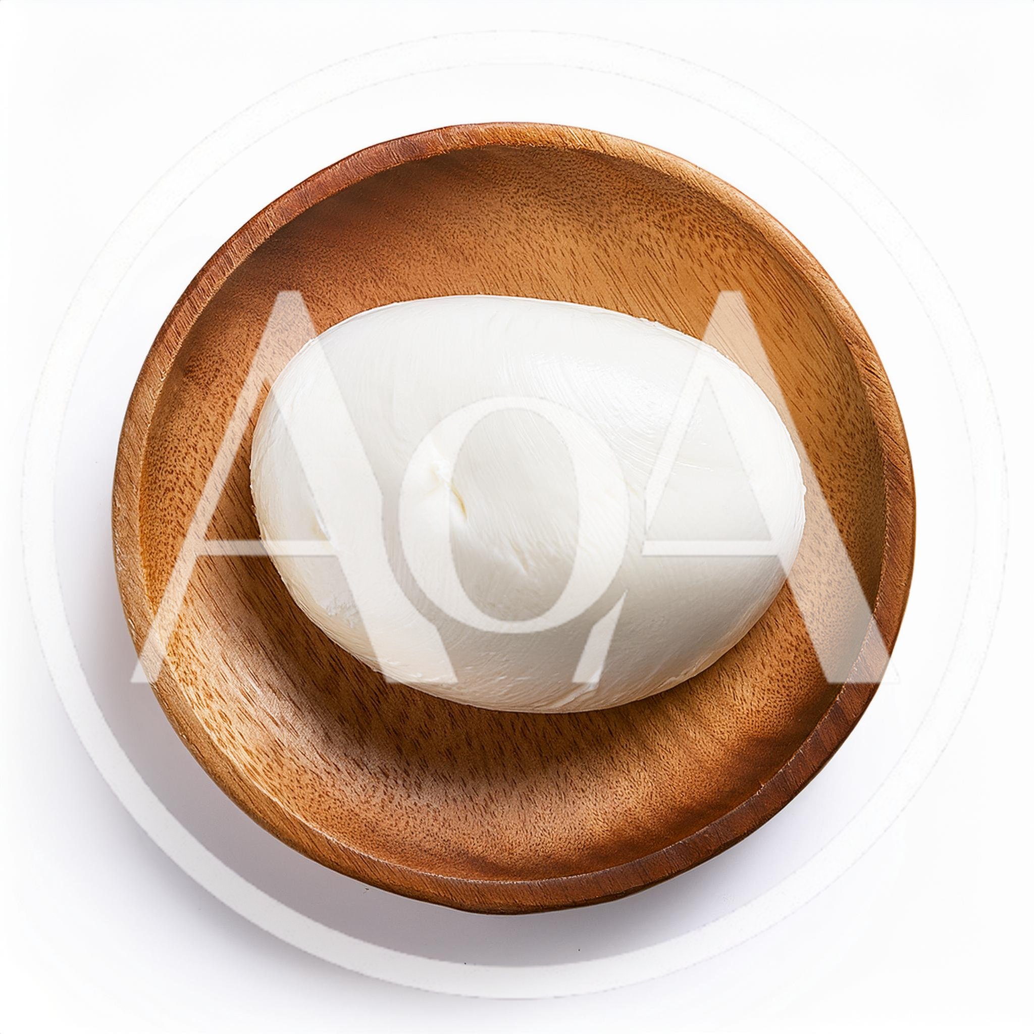 Fresh Mozzarella Ball In A Wooden Bowl