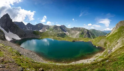 Panoramic View Of Alpine Lake In Caucasus Mountains