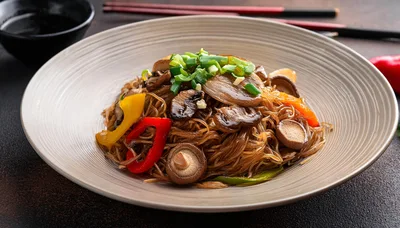 Stir Fried Glass Noodles With Vegetables And Mushrooms