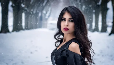 Portrait Of A Beautiful Woman In A Snowy Forest