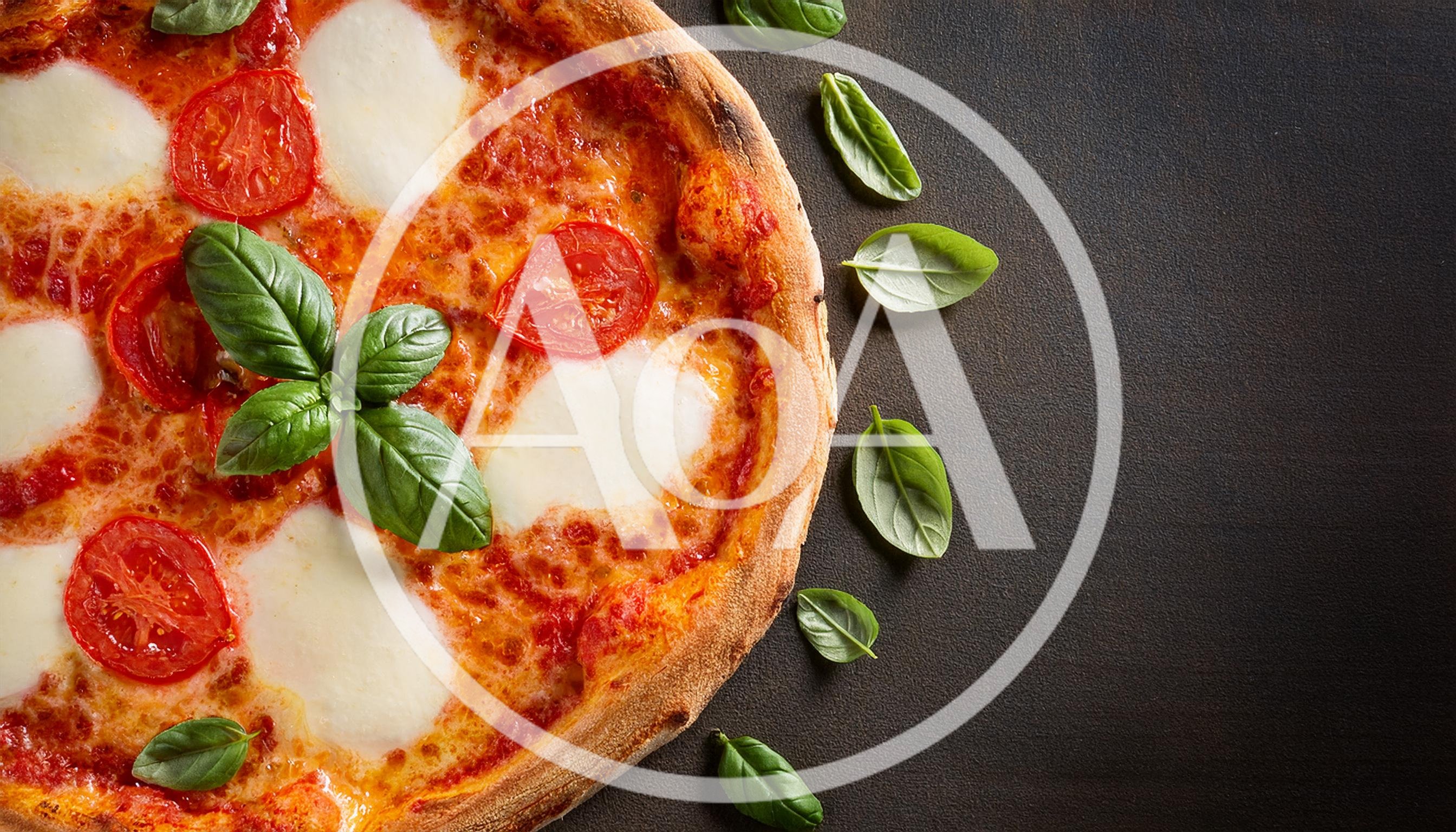 Fresh Margherita Pizza With Basil Leaves On Dark Background