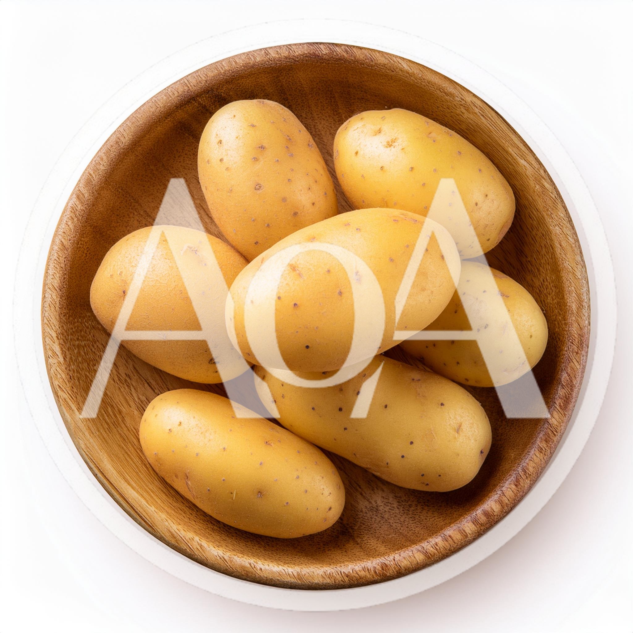 Fresh Raw Potatoes In A Wooden Bowl