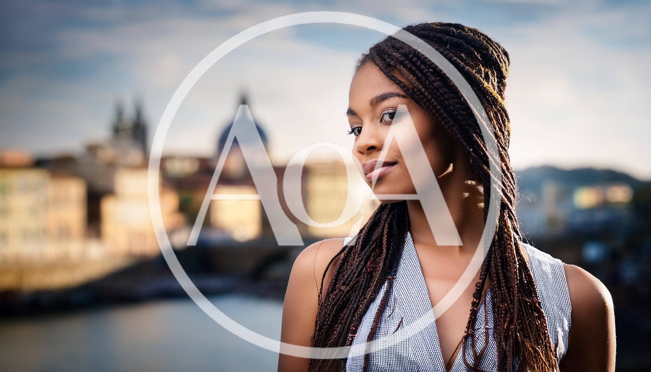 Portrait Of A Young Woman With Braided Hair