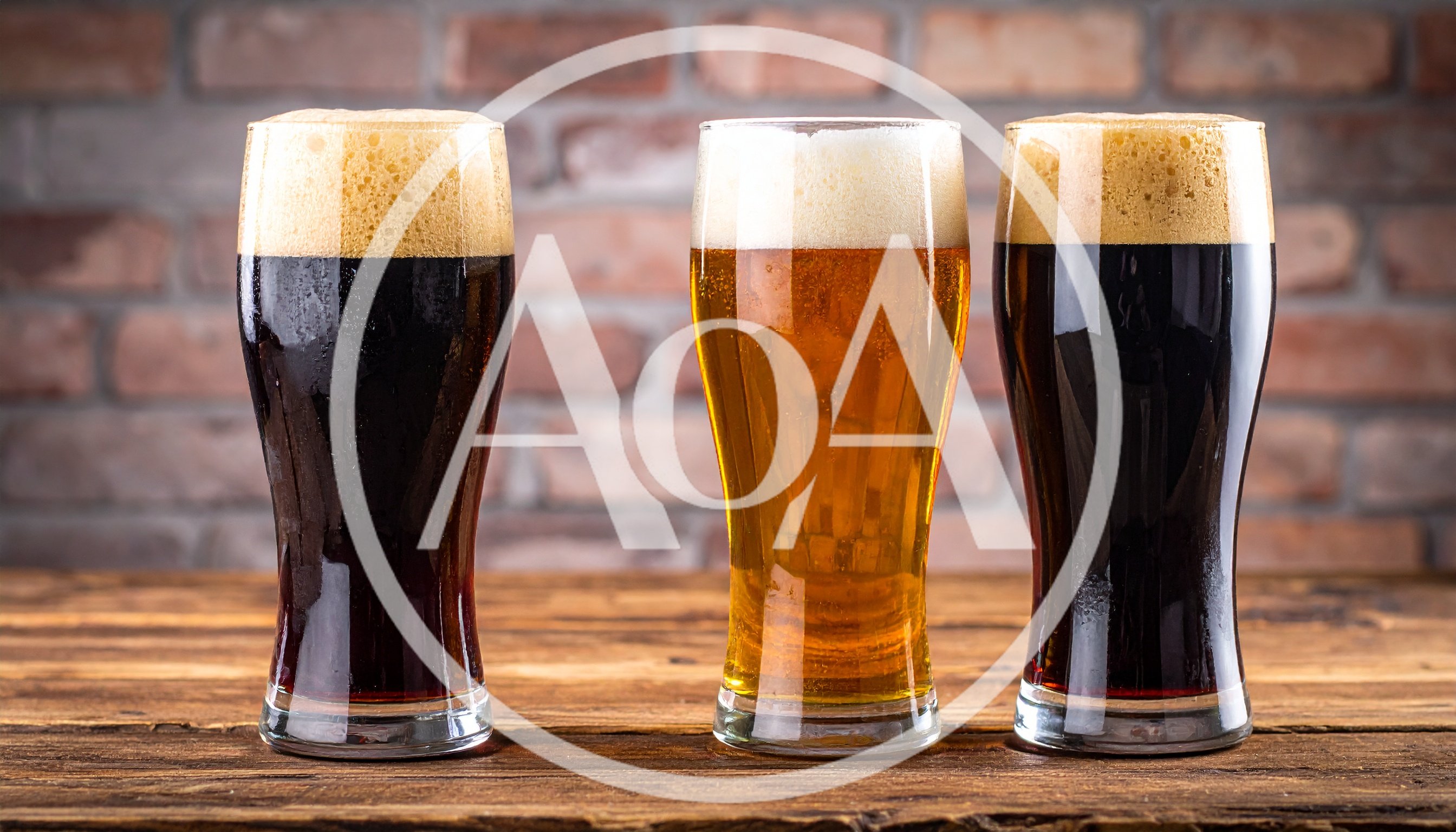 Three Glasses Of Beer On A Wooden Table