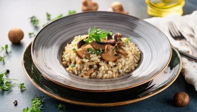 Mushroom Risotto Served In A Ceramic Bowl