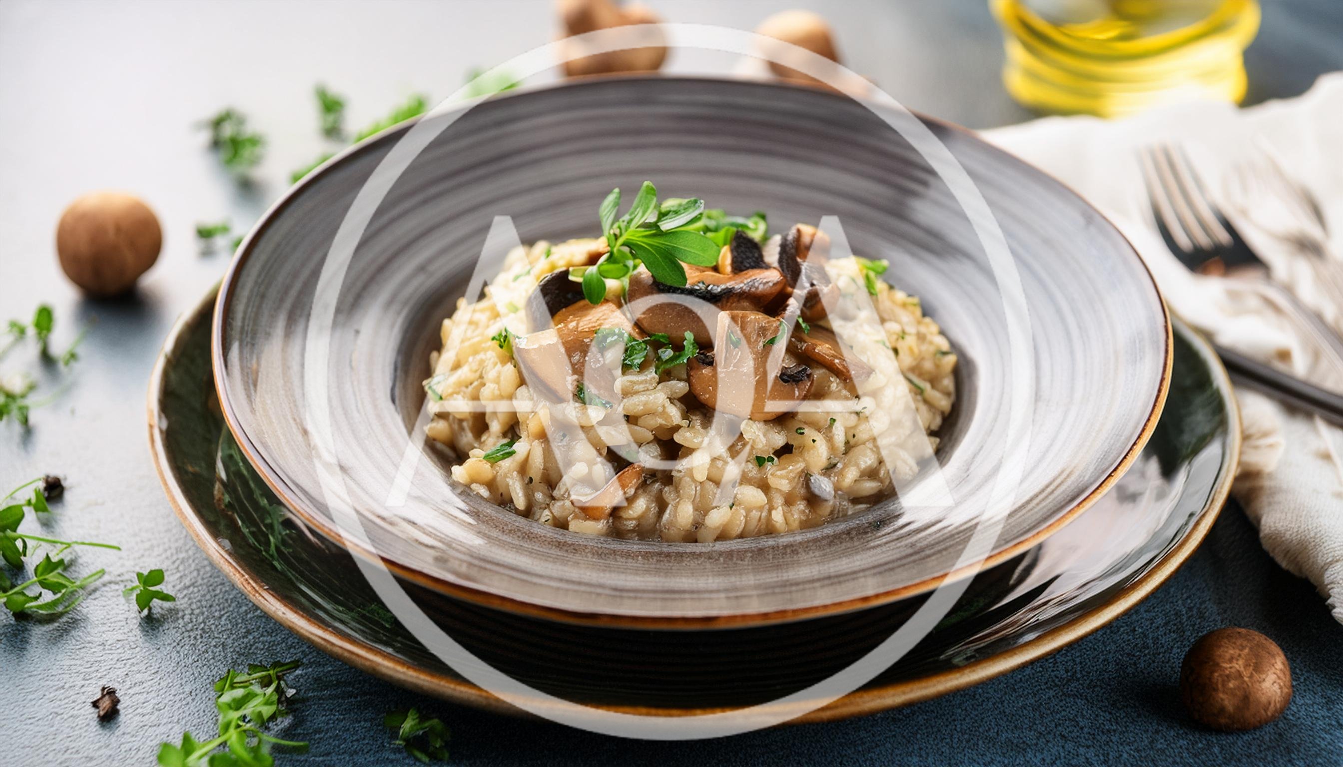 Mushroom Risotto Served In A Ceramic Bowl