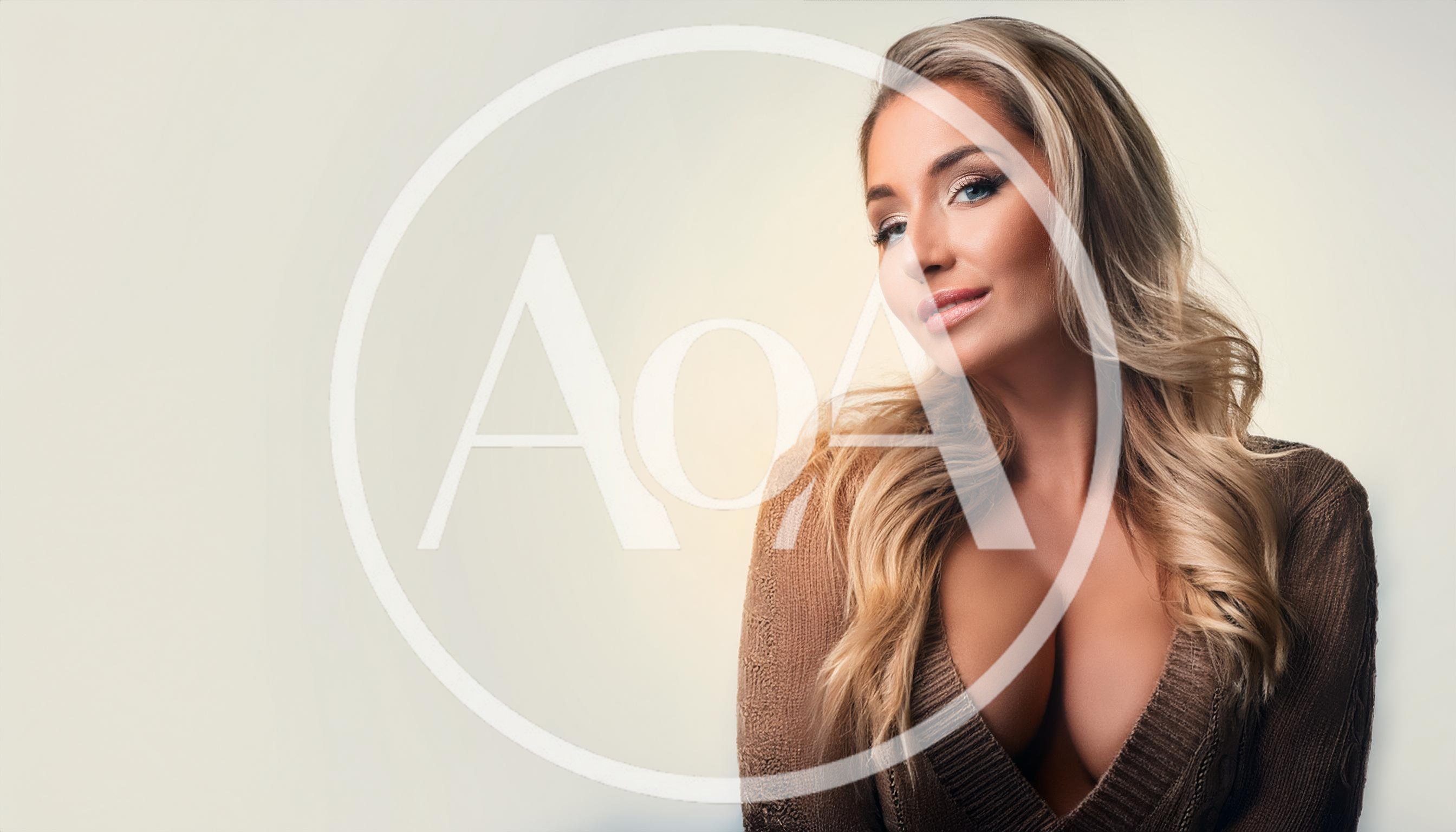 Portrait Of A Beautiful Blonde Woman In A Sweater
