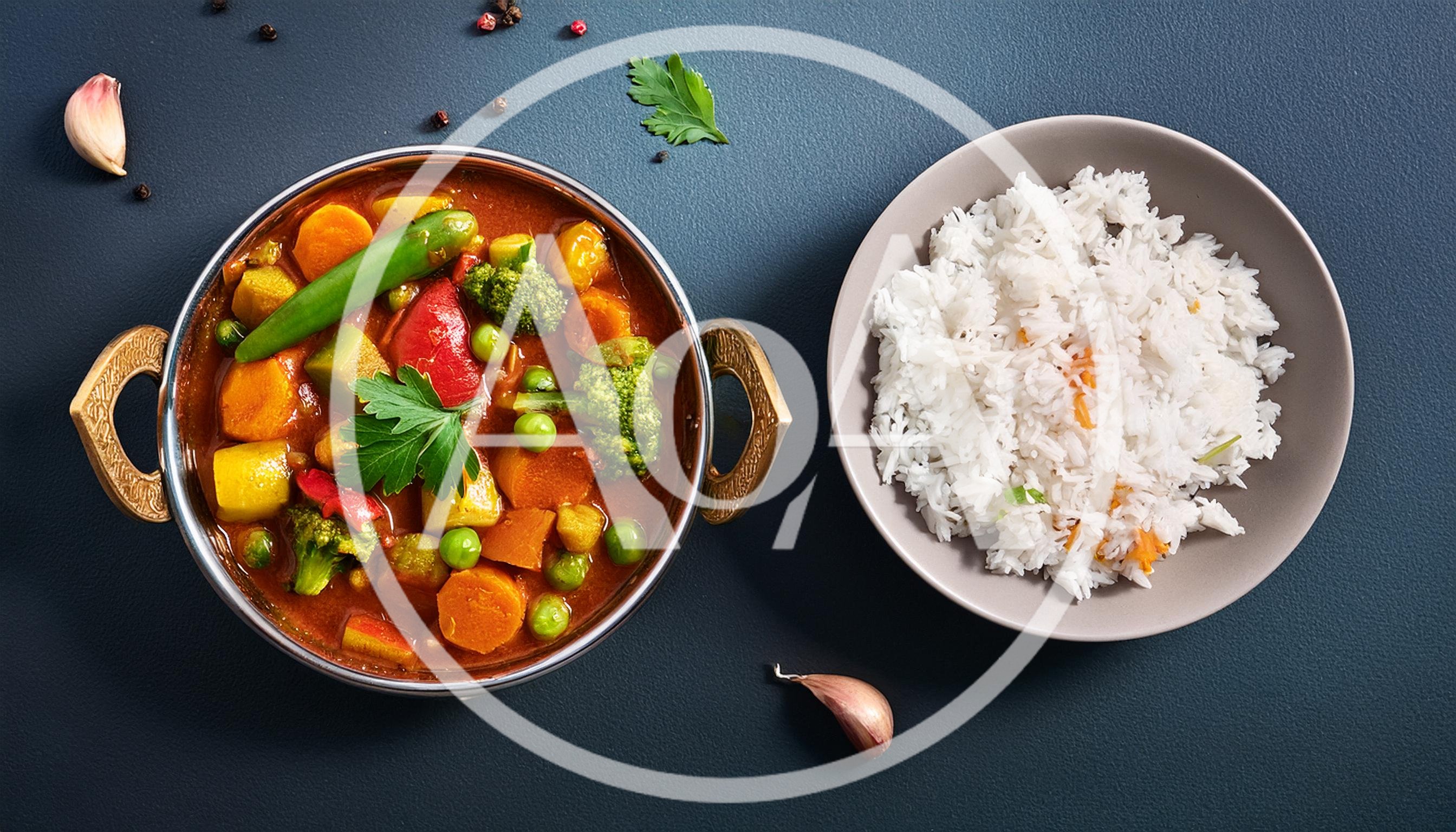 Vegetable Curry With Steamed Rice In A Bowl