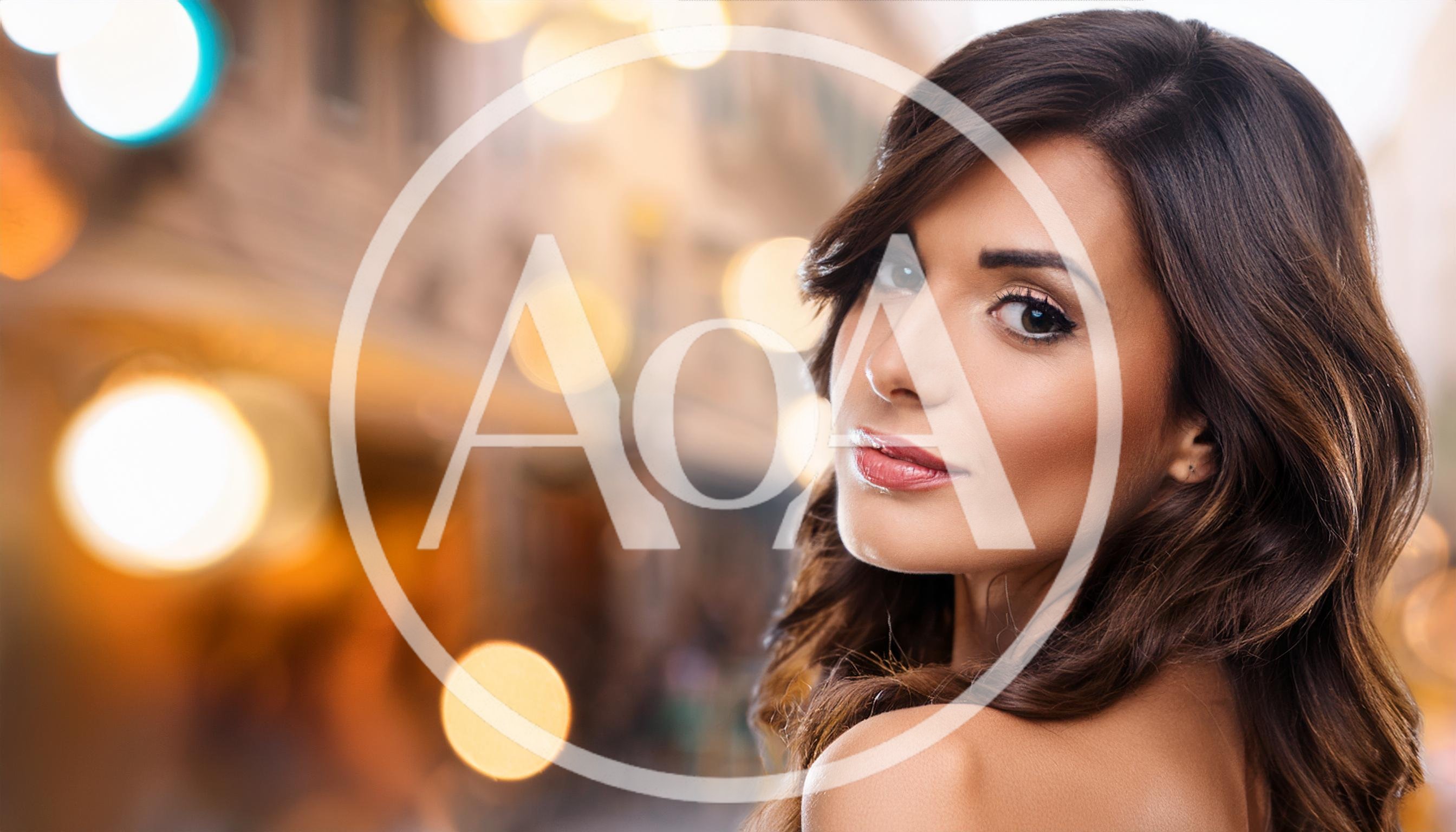 Portrait Of A Beautiful Woman With Wavy Brown Hair