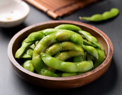 Fresh Steamed Edamame Beans In A Wooden Bowl