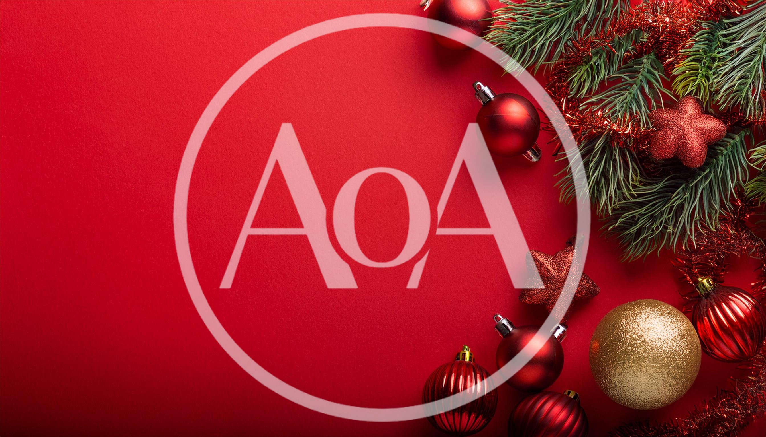 Christmas Ornaments and Pine Branches on Red Background