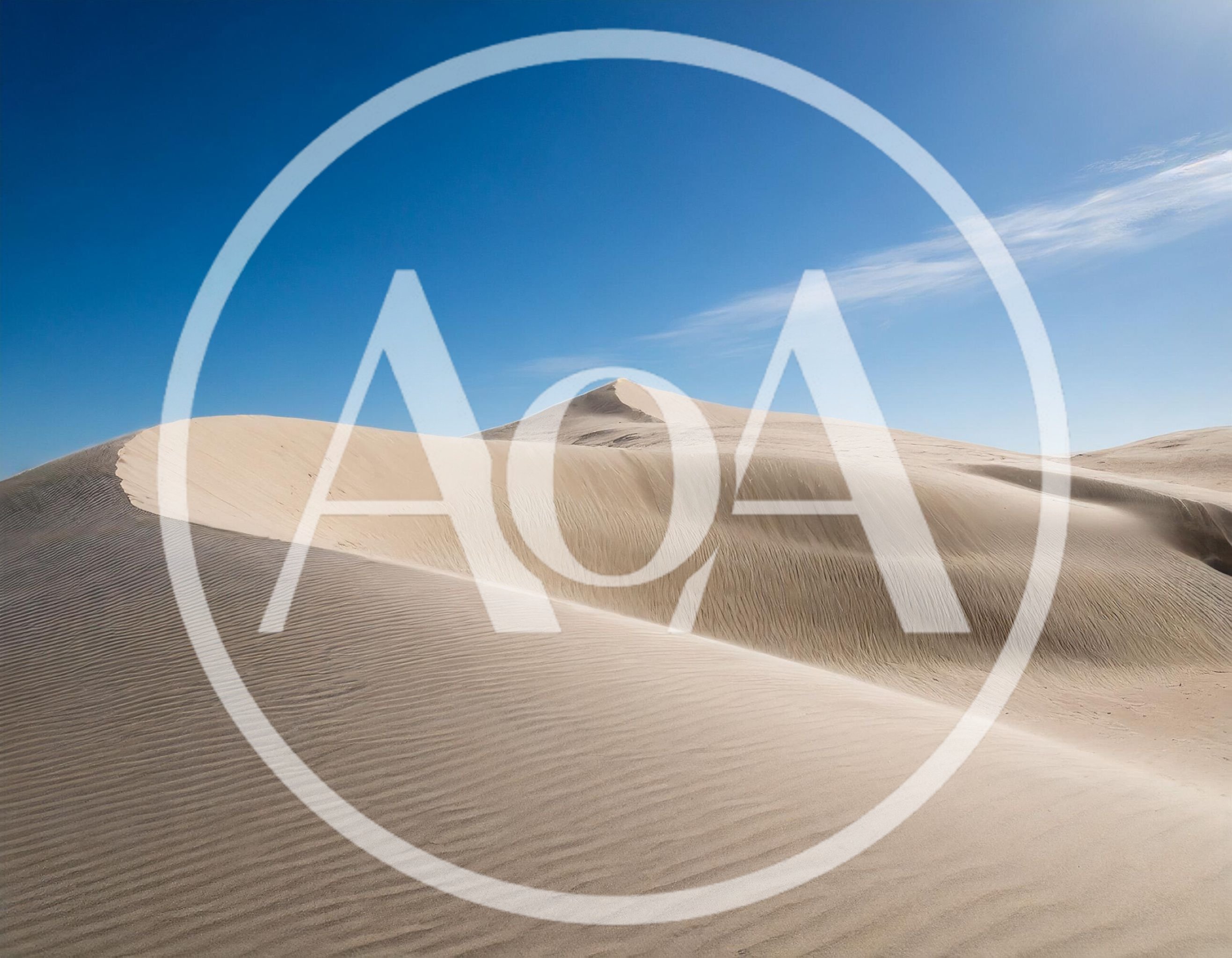 Expansive Sand Dunes Under A Clear Blue Sky