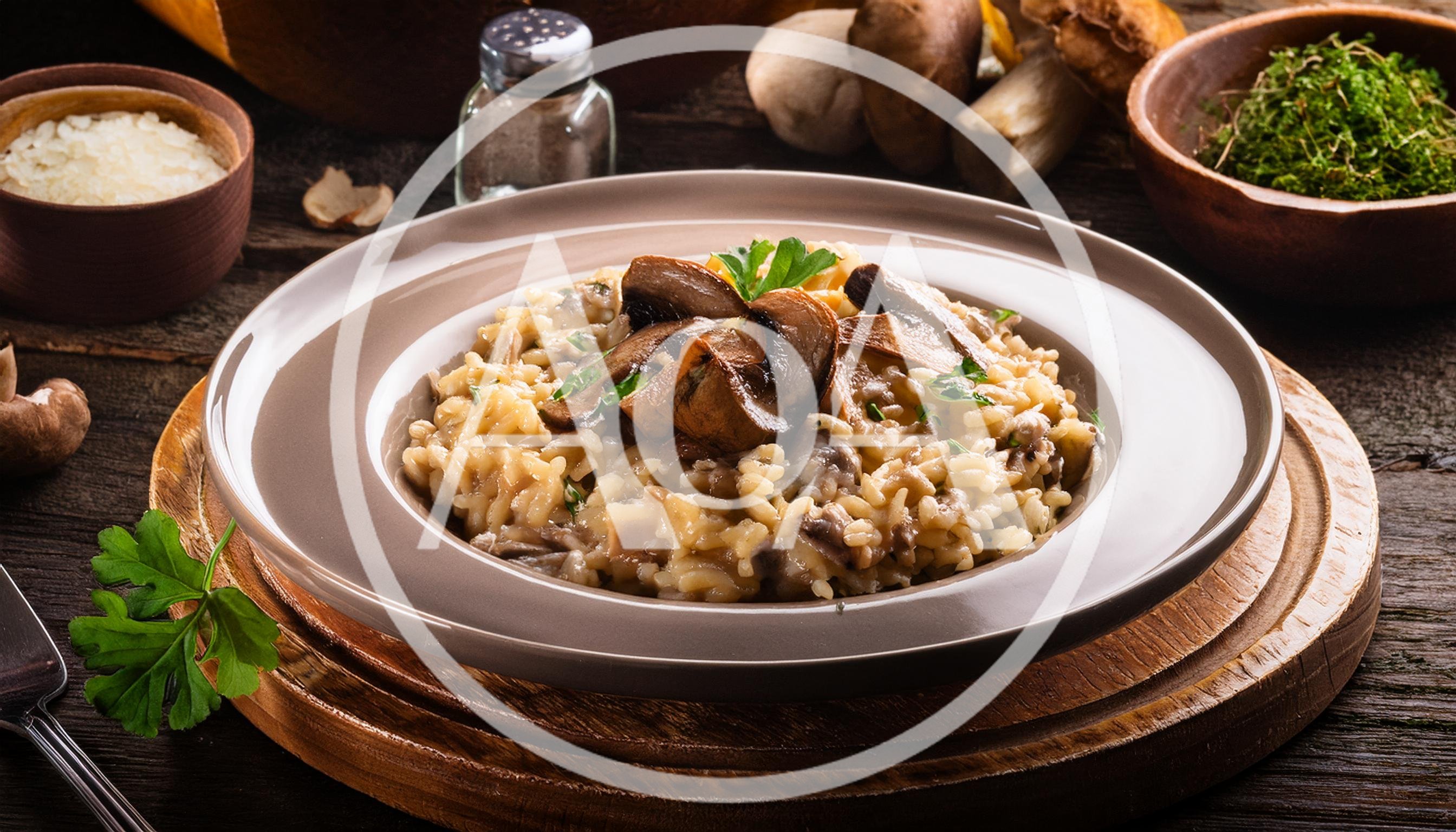 Mushroom Risotto Served In A Ceramic Bowl