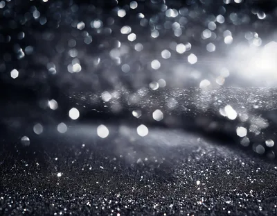 Abstract Silver Glitter Background With Bokeh Light Effects