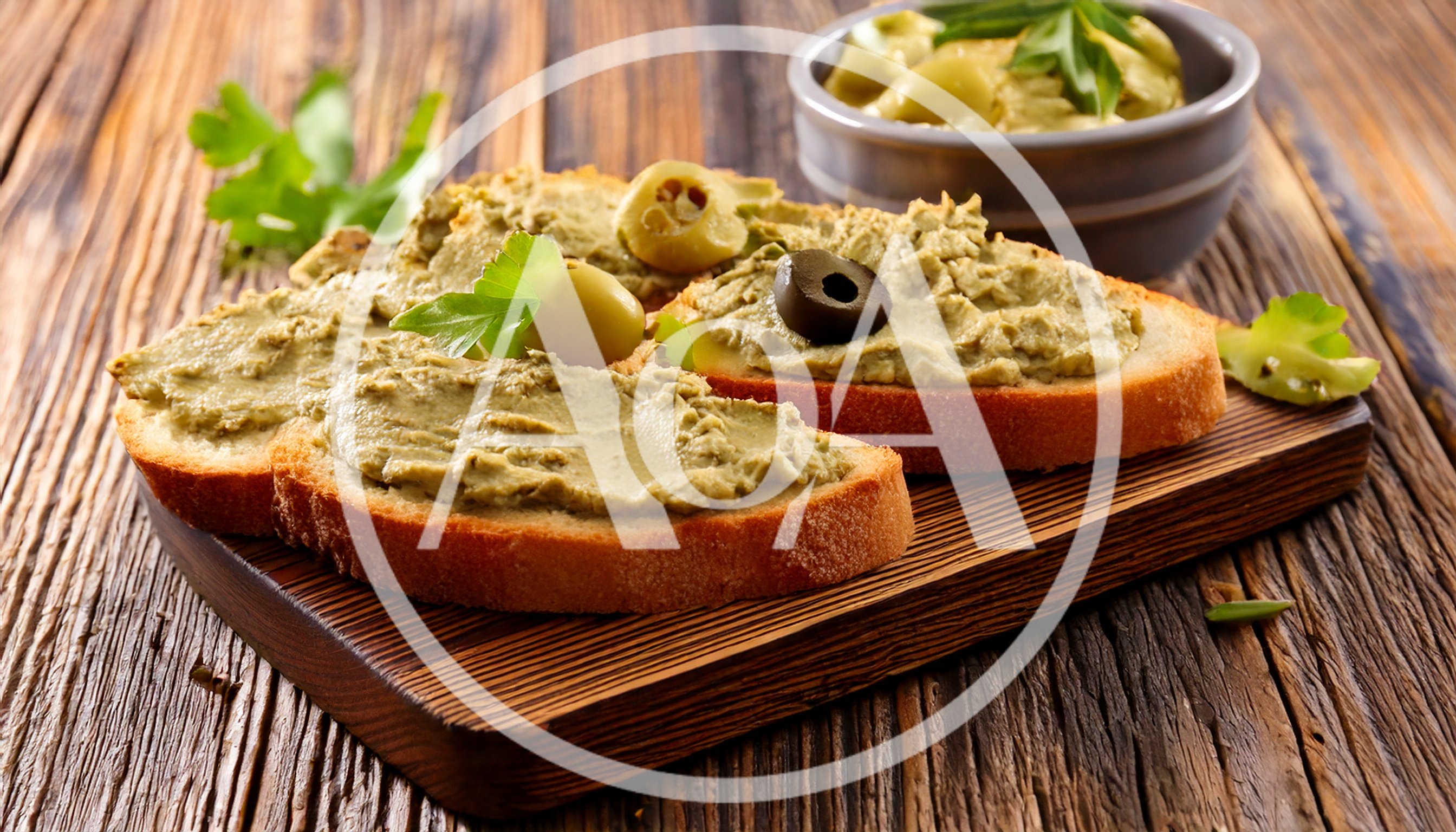 Toasted Bread Slices Topped With Olive Tapenade
