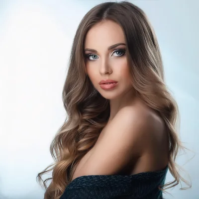 Portrait Of A Beautiful Young Woman With Long Hair