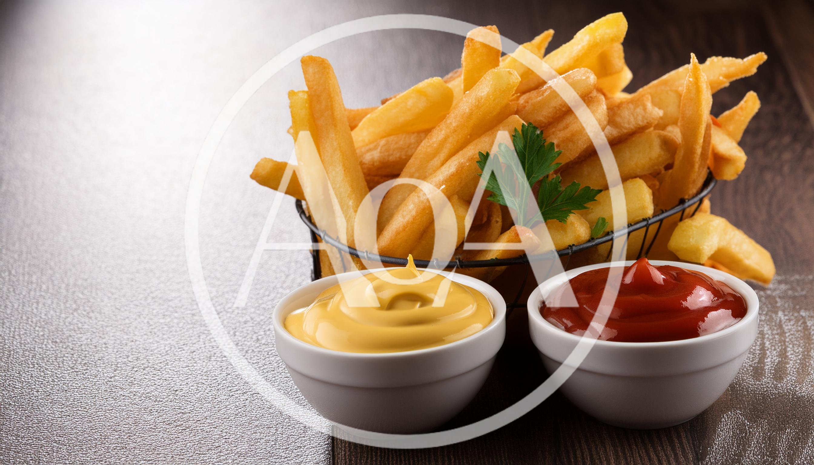 Basket Of Golden French Fries With Dipping Sauces