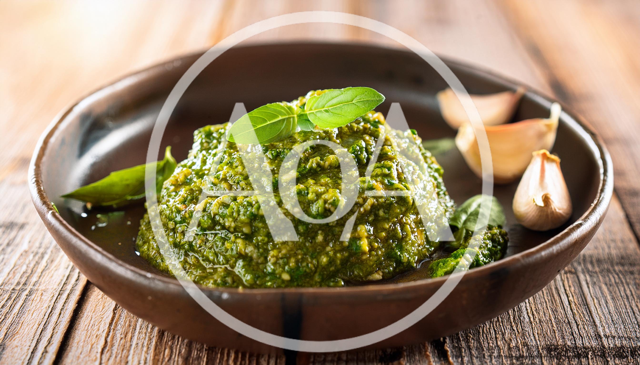 Fresh Green Pesto Sauce in a Rustic Bowl