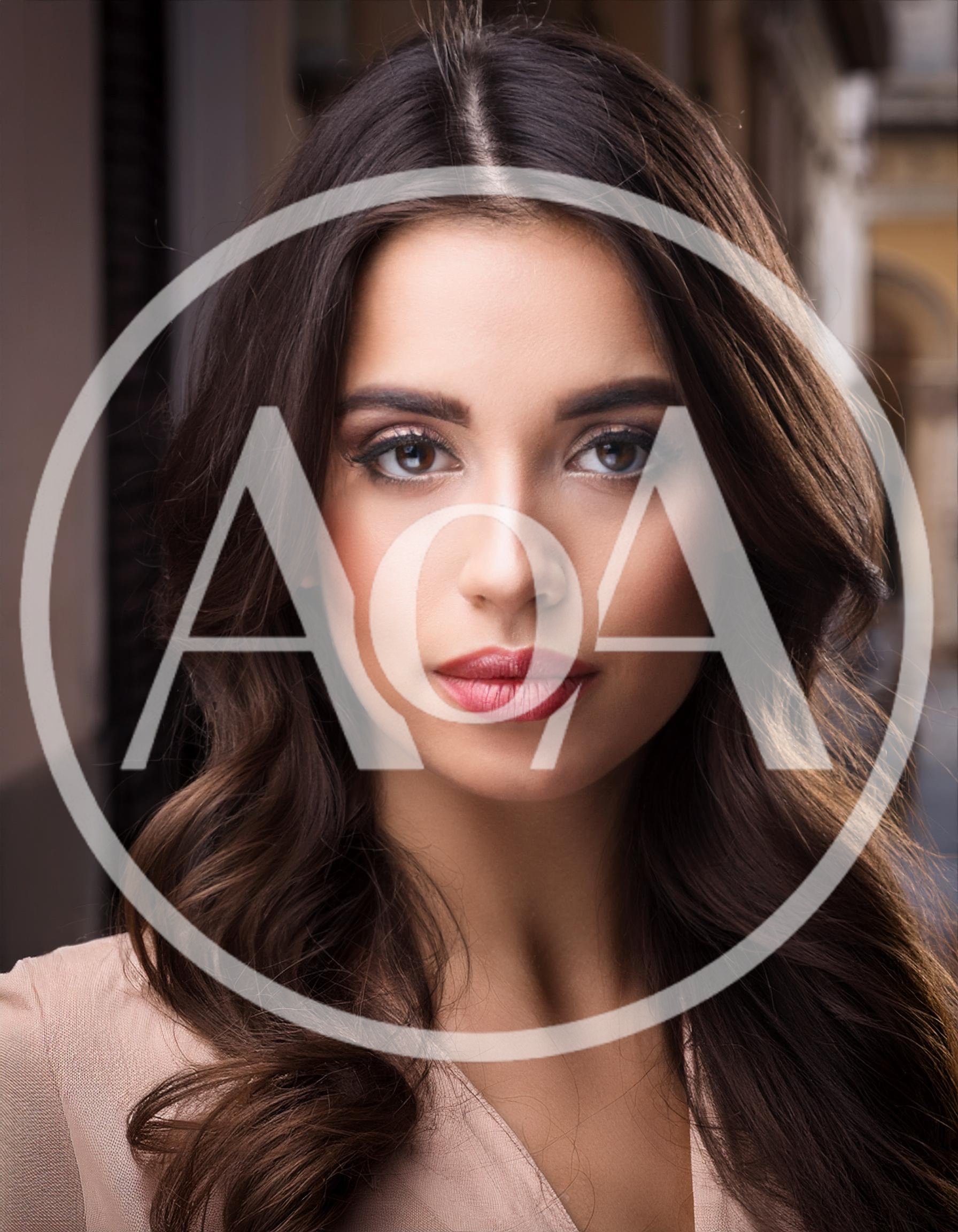 Portrait Of A Beautiful Young Woman With Long Hair