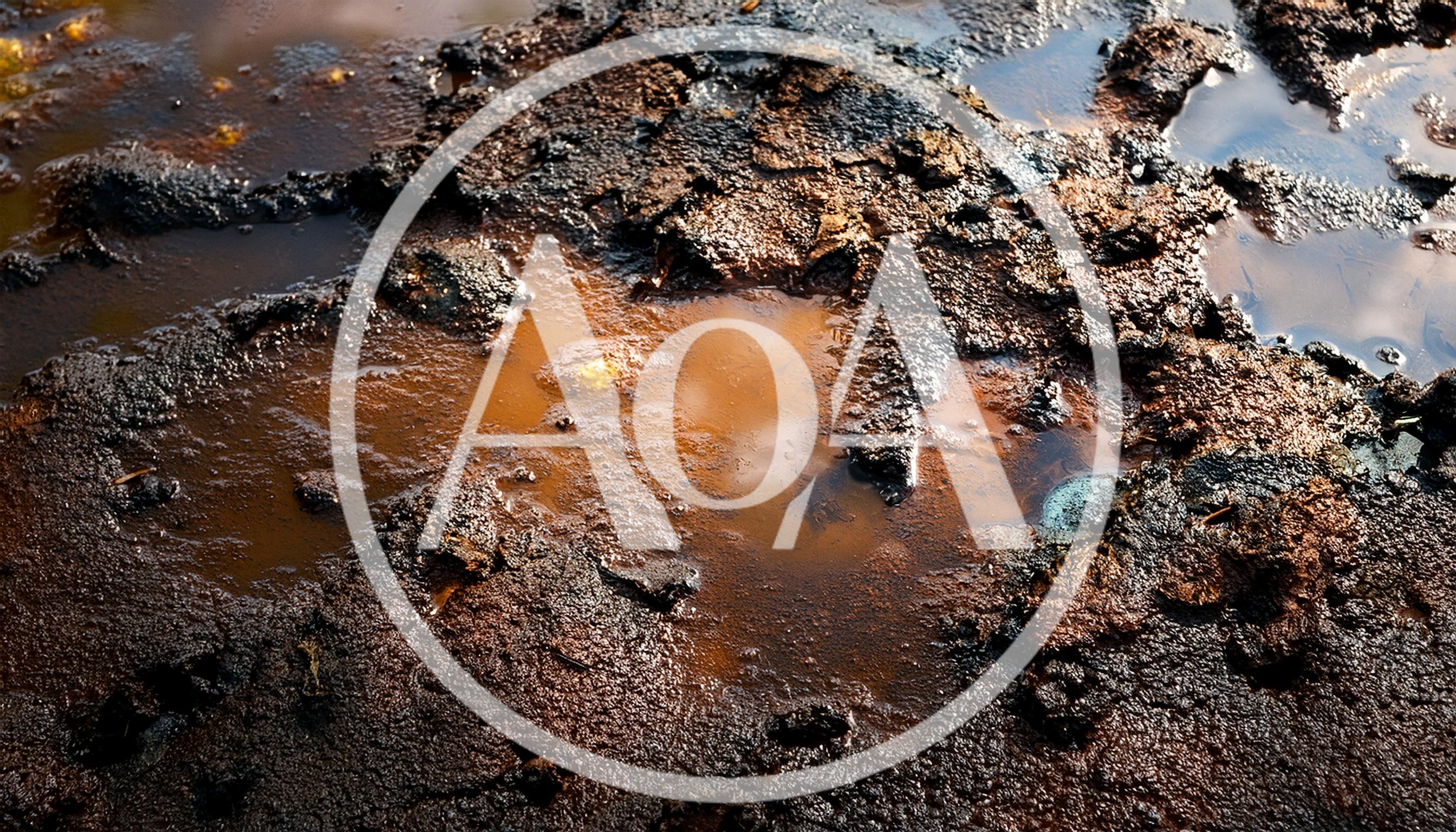 Muddy Ground With Reflective Puddles And Texture