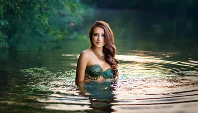 Beautiful Mermaid Woman Posing In A Calm Lake